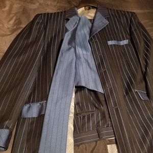 Two Men's Suits Vests included